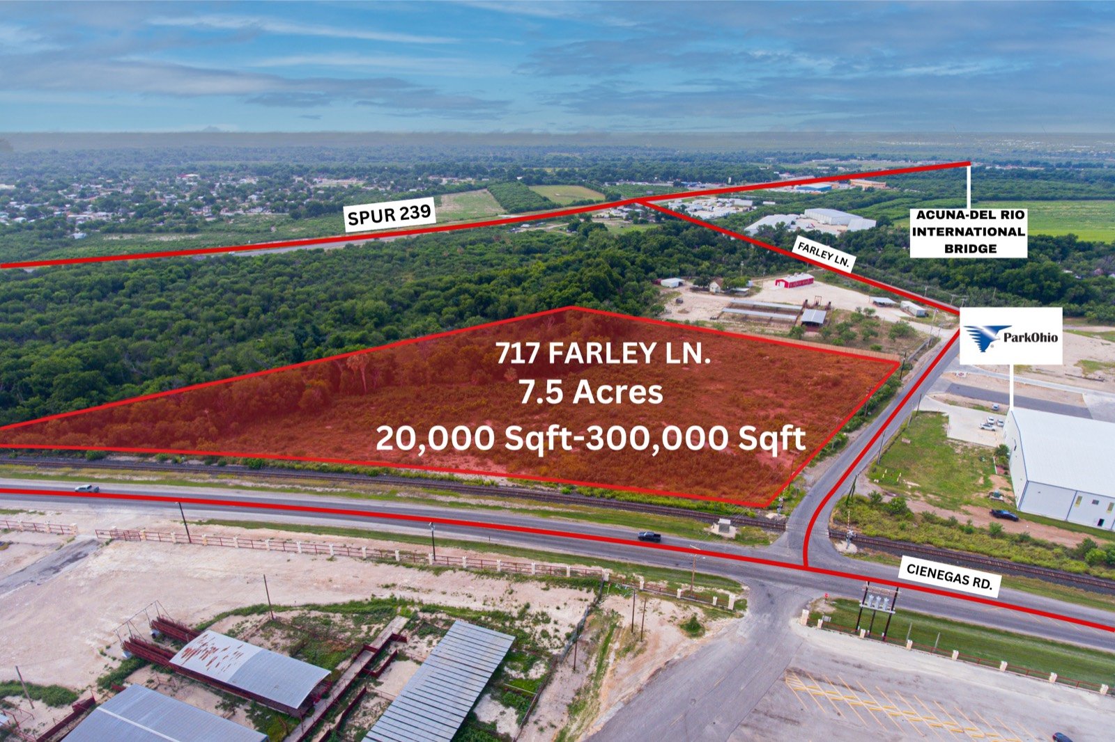 717 Farley Lane from the air, the 7.5-acre parcel outlined, with Spur 239 and the Acuña–Del Rio international bridge behind